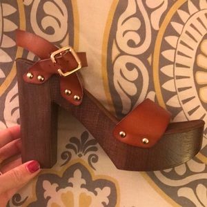 Chunky wooden heels. Never been worn